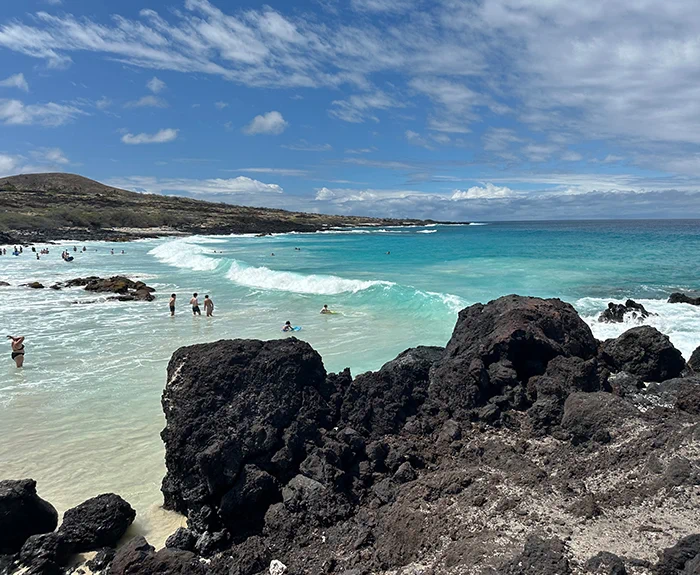 People playing the Kona, Hawaii beach waves People playing the Kona, Hawaii beach waves